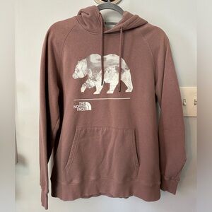 The North Face ladies pink hooded sweatshirt. Size Large.